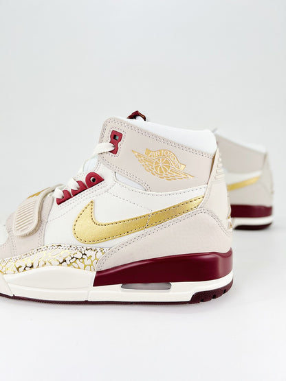 Air Jordan Legacy 312 – Edição Dourada/Vinho